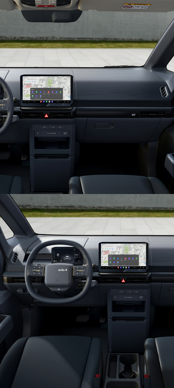 Fahrerperspektive auf das Cockpit des Kia PV5 Cargo mit Lenkrad und Infotainment-Display.